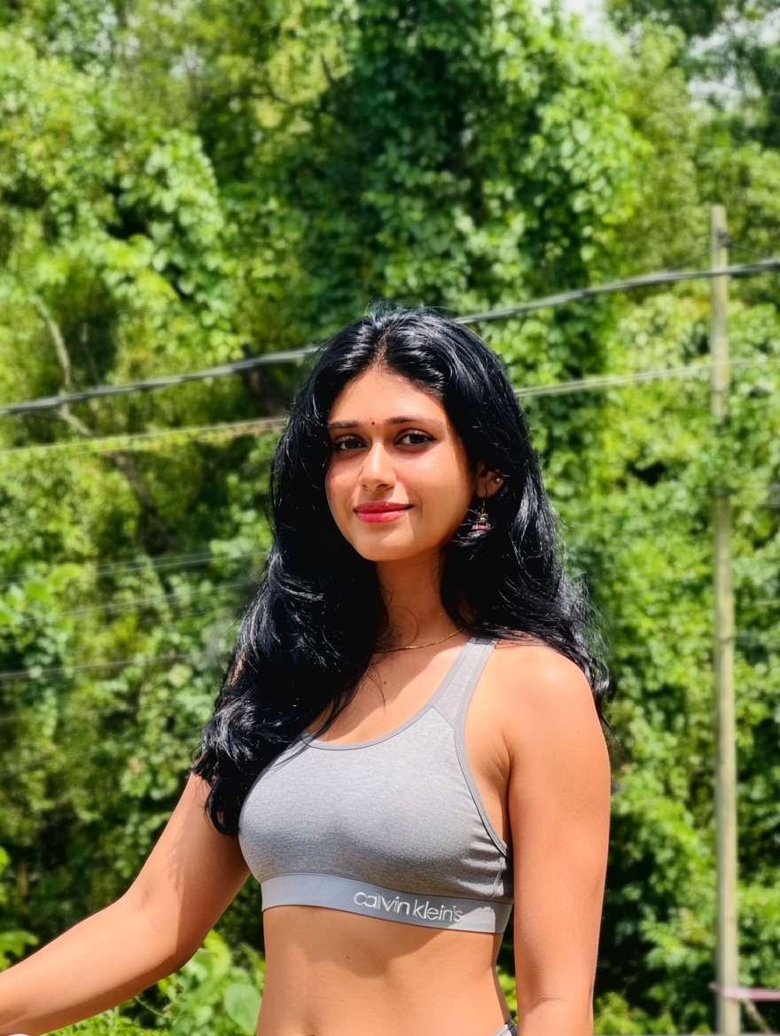 Change her clothes to a calvin kleins grey sports bra